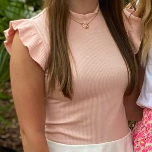 Ruffle sleeve storia top